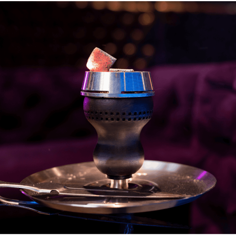 Shisha pipe with glowing charcoal at Shisha Lounge Nijmegen, Manga Marina, by the Waalkade.